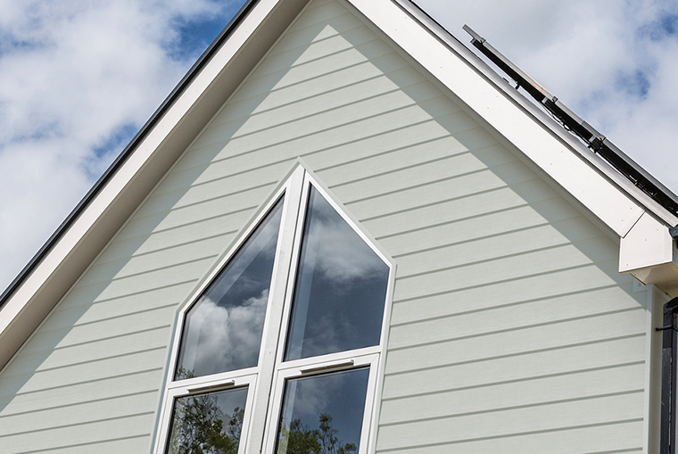 Cream external cladding on Dorset home